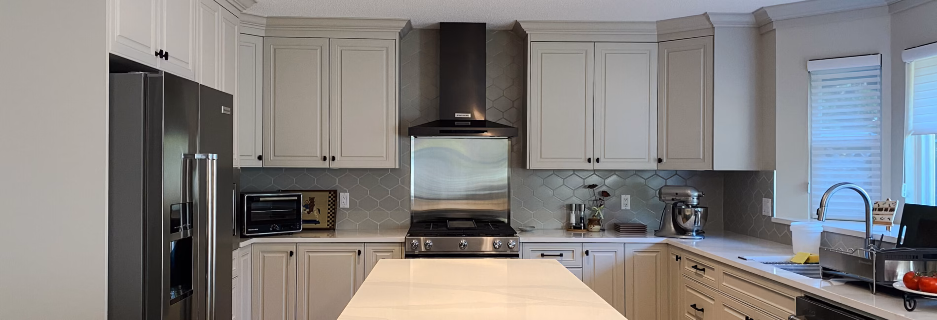 Green custom cabinets & durable quartz surfaces in Ocean Park, Surrey, BC.
