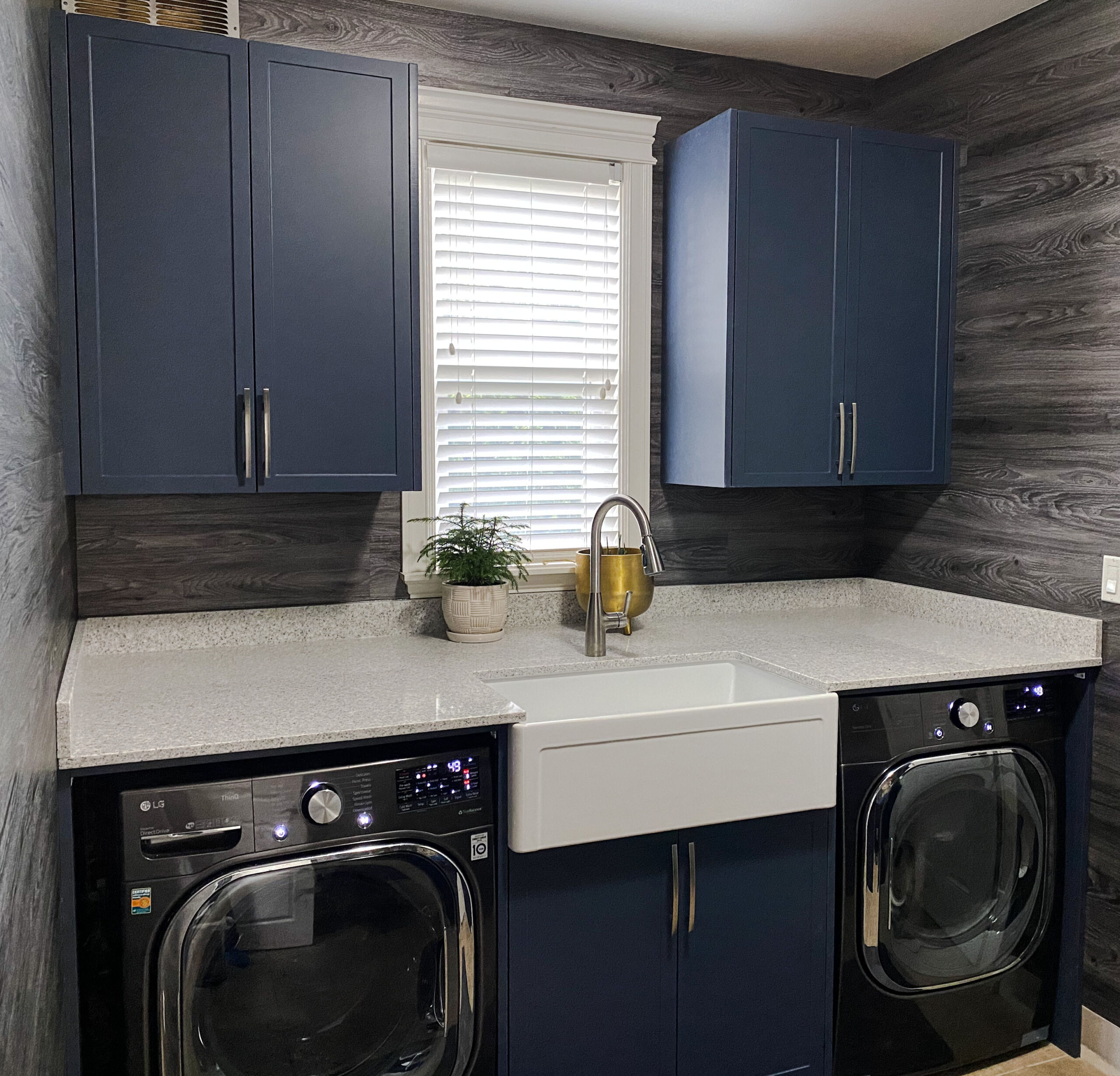 Shaker Blue Custom Cabinet & durable quartz surfaces in Fraser Heights, Surrey, BC.