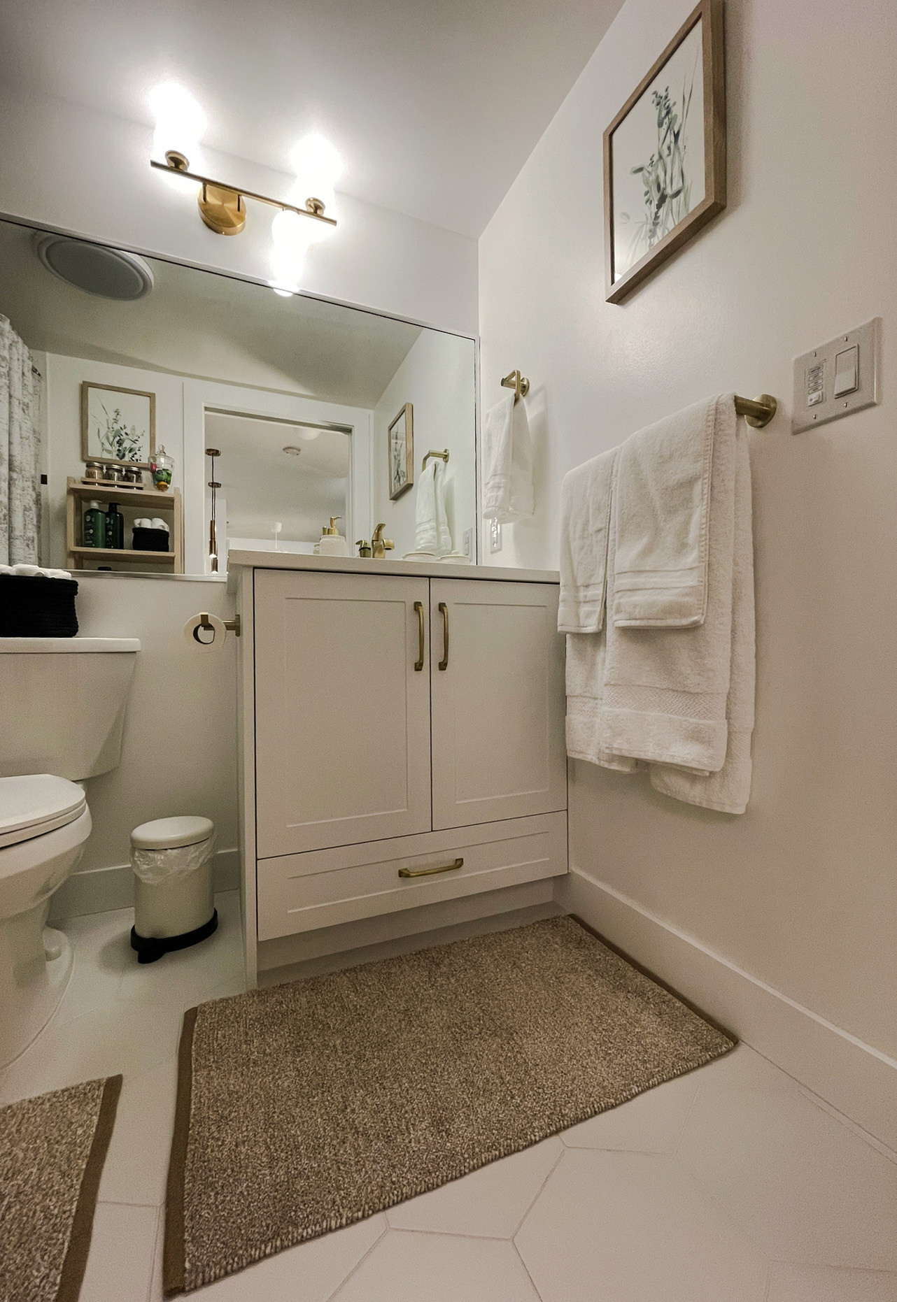 Shaker White Vanity Cabinet & functional storage solutions in Downtown Vancouver, BC.