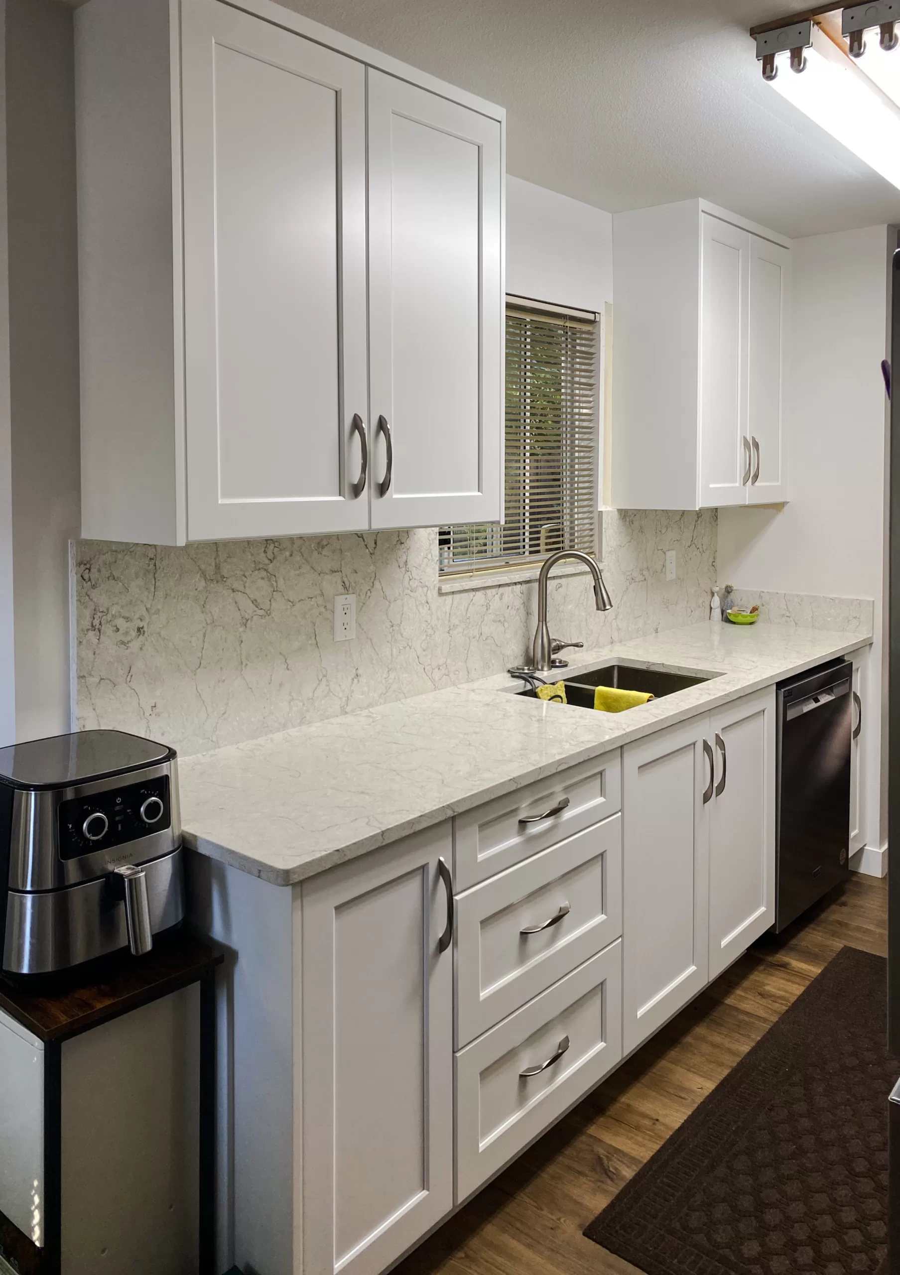 Vicostone Quartz Countertop & contemporary hardware accents in Guildford, Surrey, BC.