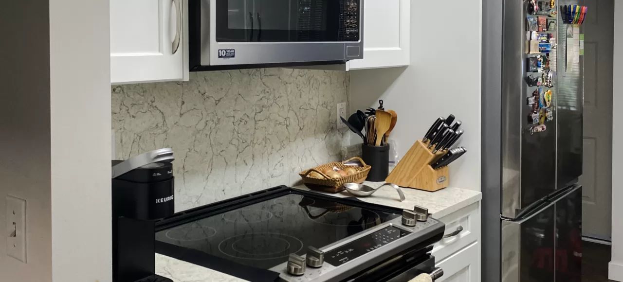 White Shaker Kitchen Cabinet & durable quartz surfaces in Guildford, Surrey, BC.