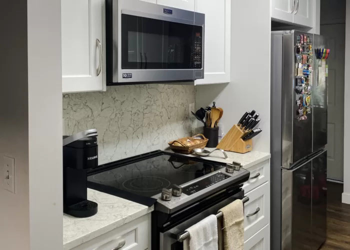White Shaker Kitchen Cabinet & durable quartz surfaces in Guildford, Surrey, BC.