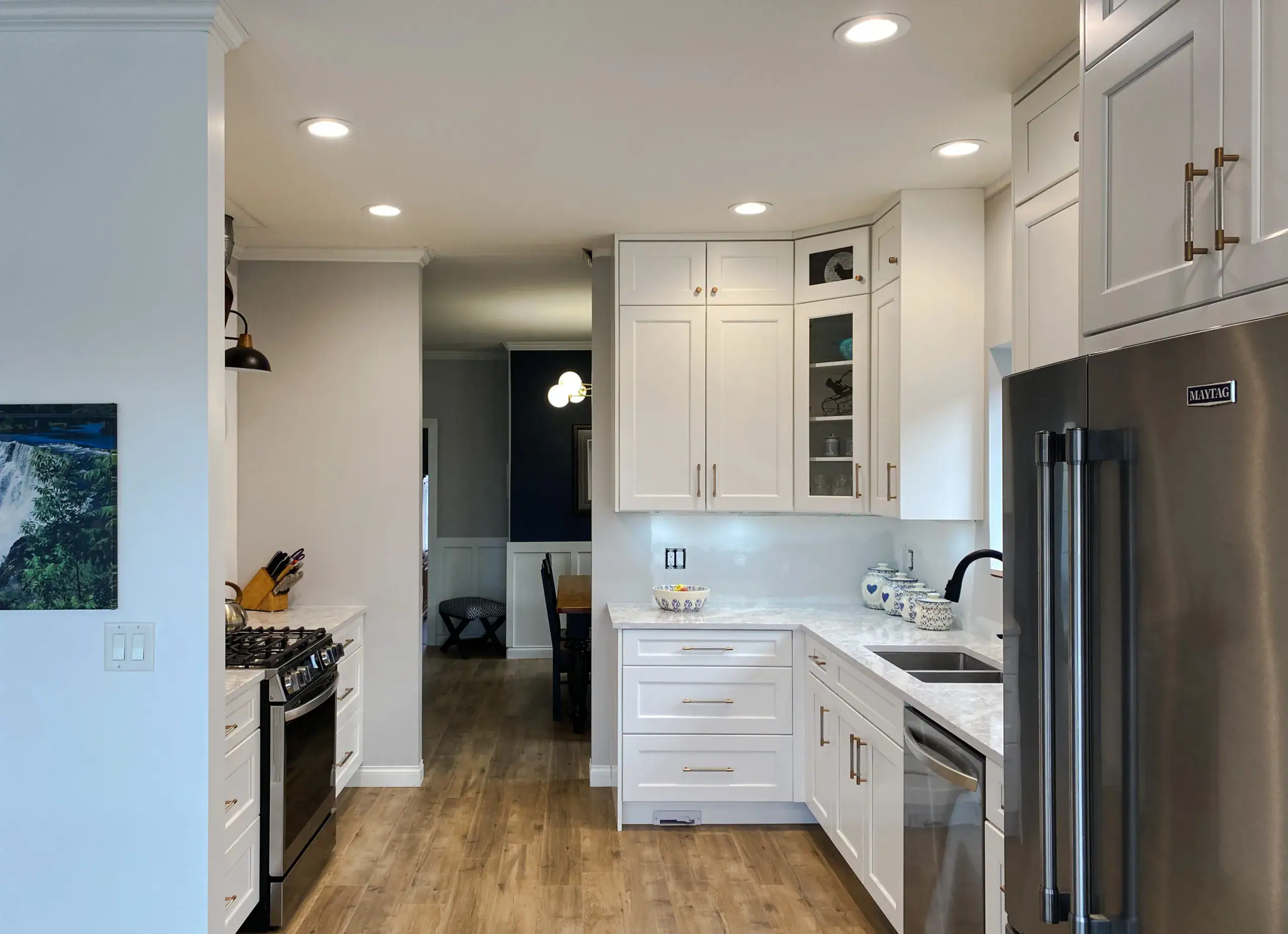White shaker cabinets & durable quartz surfaces in Mission, BC.