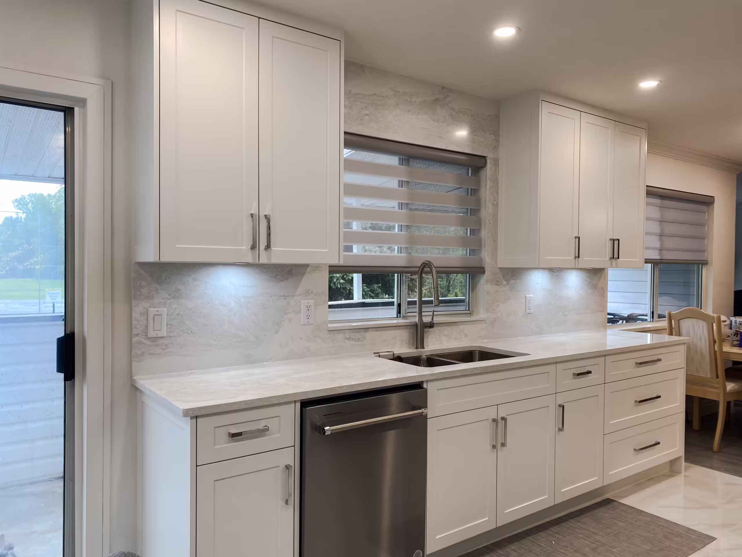 Contemporary White Shaker Kitchen Cabinet & contemporary hardware accents in Guildford, Surrey, BC.