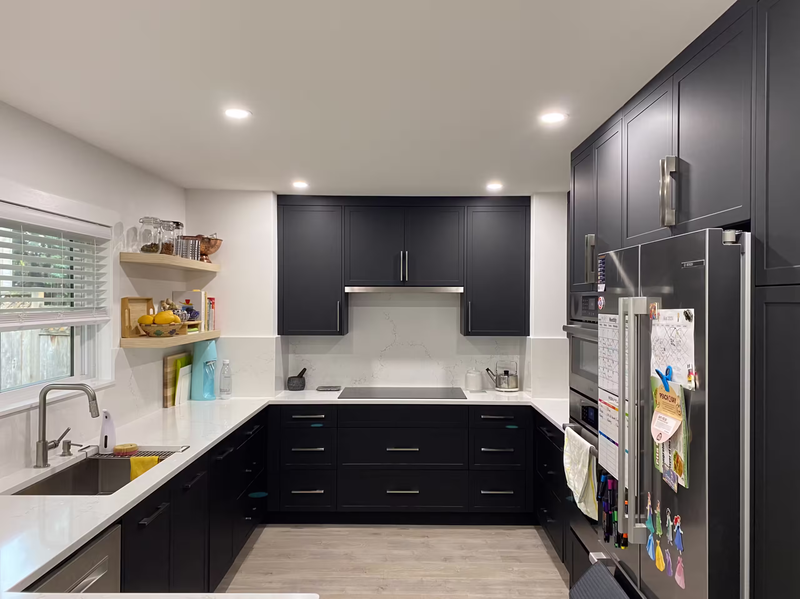 Black Shaker Kitchen Cabinets & durable quartz surfaces in Sunshine Hills, Delta, BC.