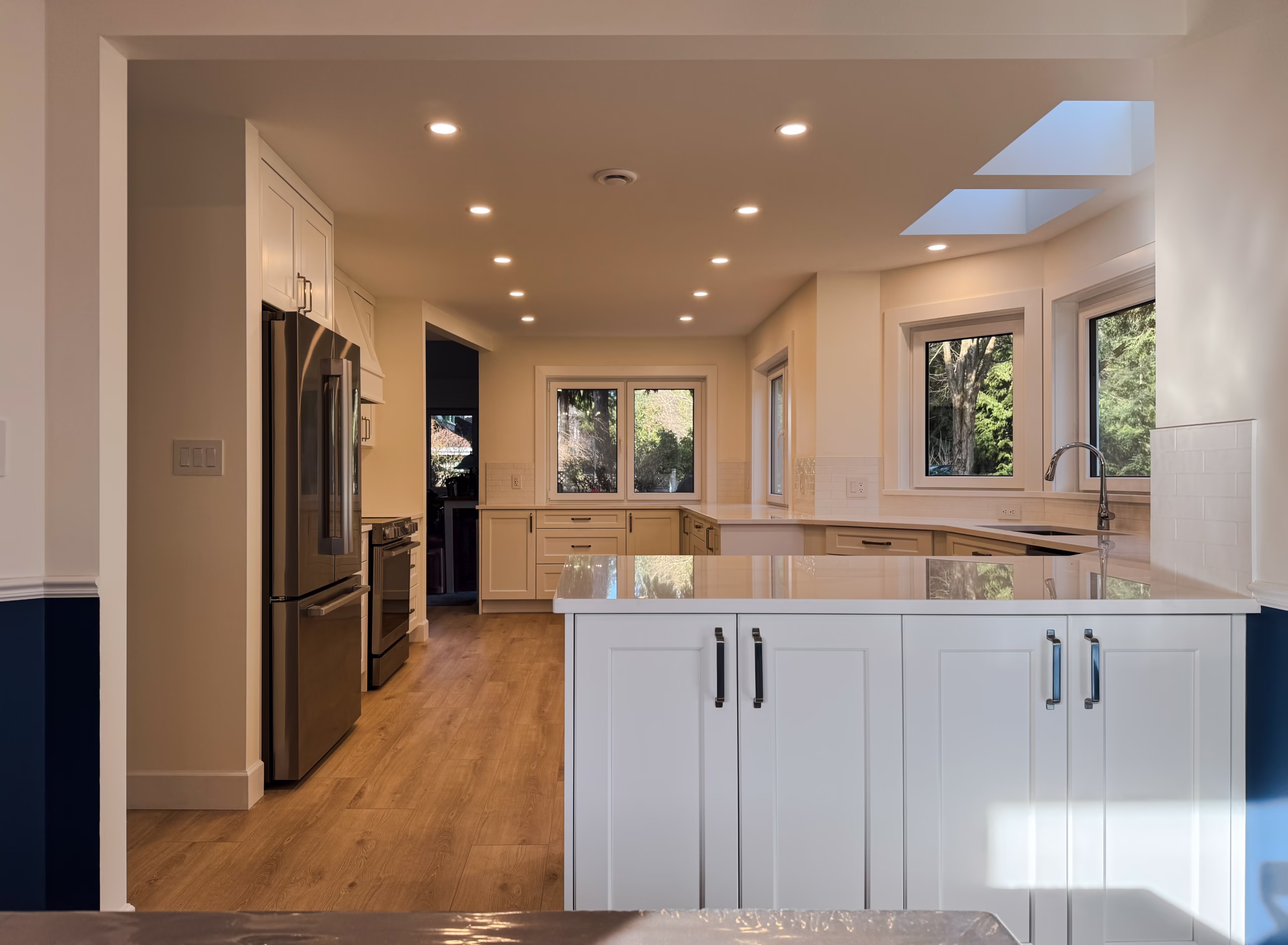 White Shaker Kitchen Cabinet & spacious island in Elgin, Surrey, BC.