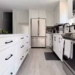 Dream White RTA cabinets with soft-close drawers â€” contemporary hardware accents in South Meadows, Pitt Meadows, BC.