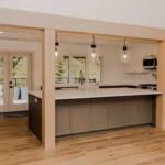 Large Umbra kitchen island with White Matt cabinets in an Otter District Langley kitchen renovation.