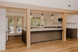 Large Umbra kitchen island with White Matt cabinets in an Otter District Langley kitchen renovation.