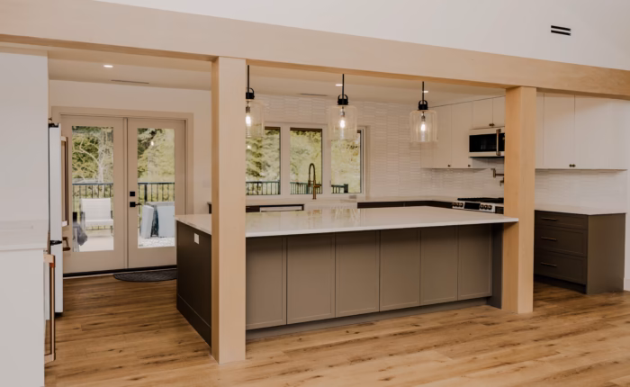 Large Umbra kitchen island with White Matt cabinets in an Otter District Langley kitchen renovation.