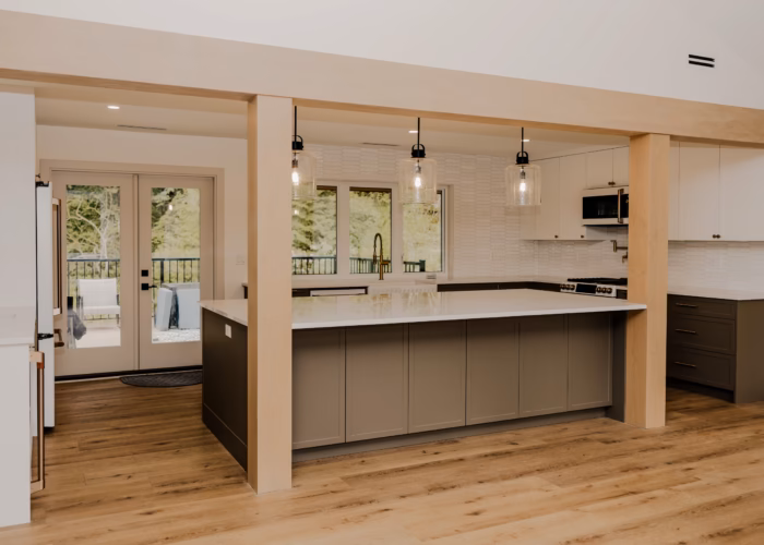 Large Umbra kitchen island with White Matt cabinets in an Otter District Langley kitchen renovation.
